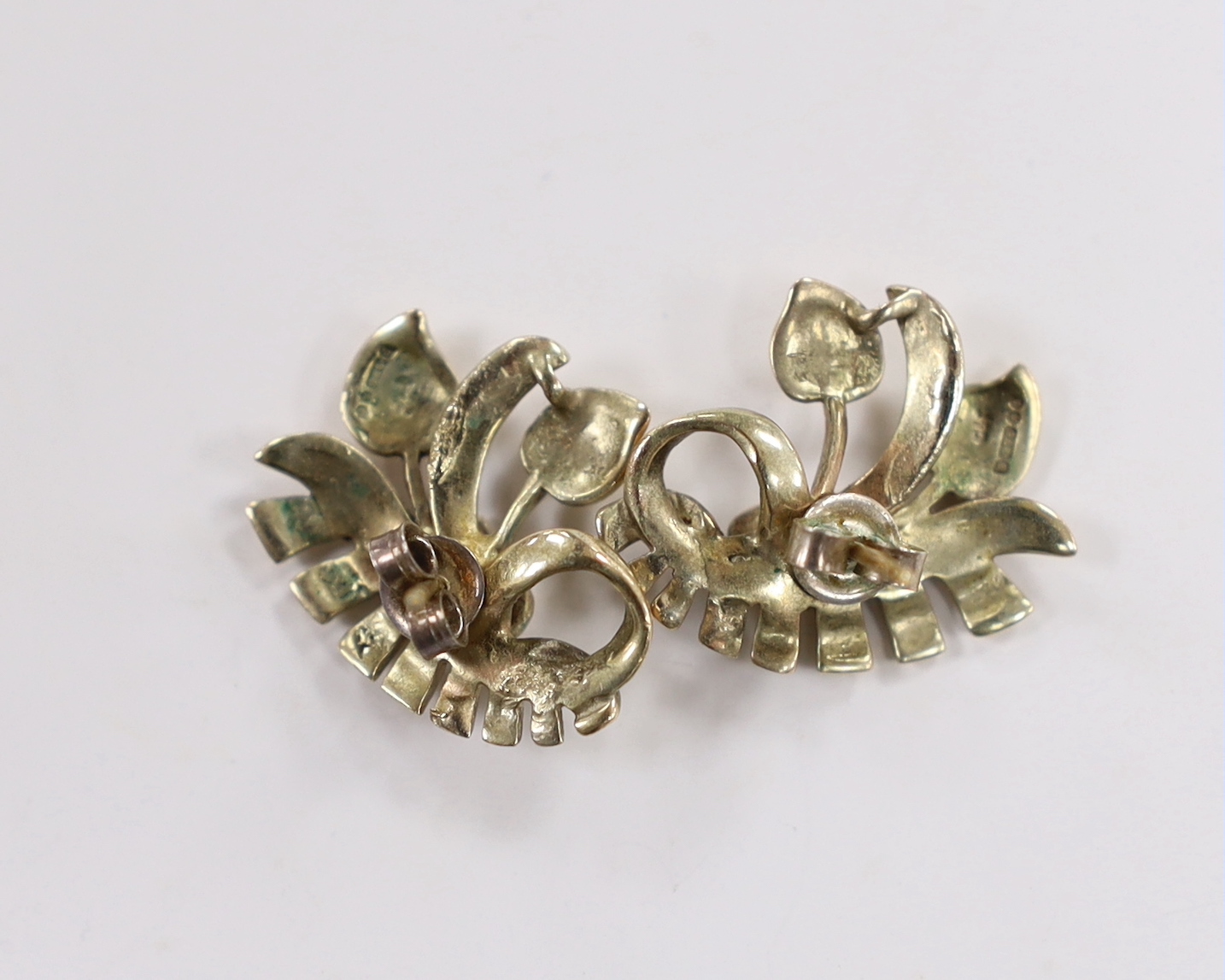 A pair of 9ct gold earrings, of scrolling foliate design, 20mm, 5.8 grams.